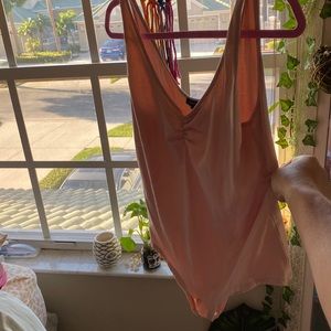 Light pink/cream body suit